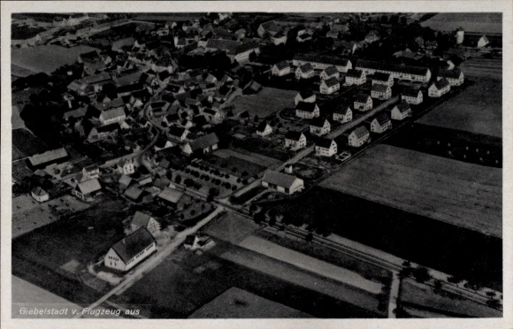 Postcard Giebelstadt in Lower Franconia, aerial view of residential areas, fields, streets