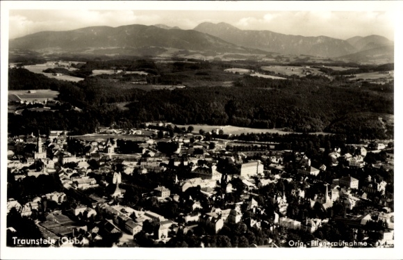 Postcard Traunstein in Upper Bavaria, aerial view of mountains in the background, architecture