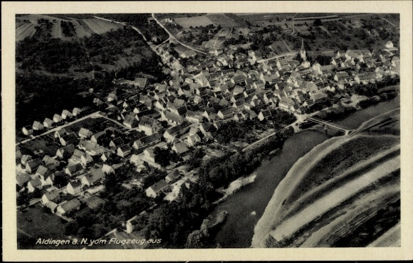 Postcard Aldingen in Württemberg, aerial view of houses, river in the foreground, -sound