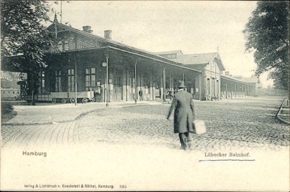Postcard Hamburg Mitte St. Georg, Lübeck train station seen from the street, traveler with suitcase