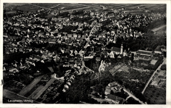 Postcard Laupheim in Upper Swabia, aerial view of the city, many houses, church