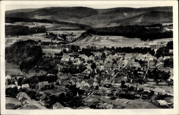 Ak Bad Iburg in Niedersachsen, Fliegeraufnahme, Panorama vom Ort