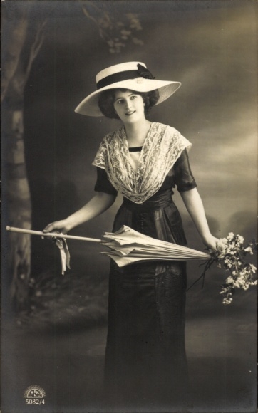 Postcard Lady in a dress with hat and umbrella, standing portrait
