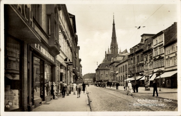 Photo Postcard Mühlhausen Thuringia, Hindenburgstraße with shops