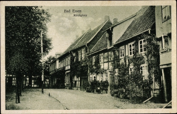 Ak Bad Essen in Nedersaksen, kerkplein, straatdeel