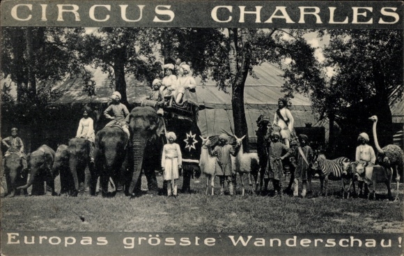 Postcard Circus Charles, Indian caravan with exotic animals, elephants, llamas, camels, zebras, ostriches