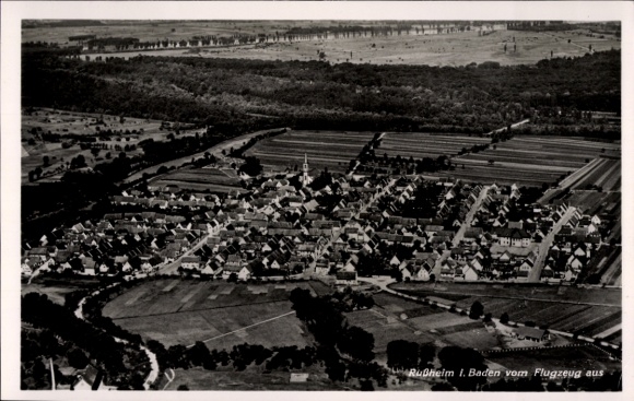 Postcard Rußheim Dettenheim in Baden, aerial view of Rußheim, agricultural areas, houses