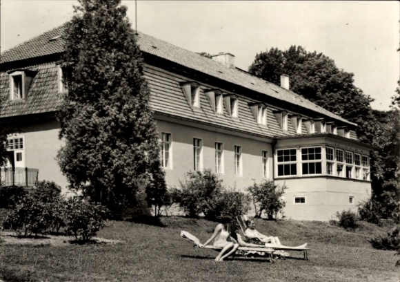 Postcard Sarow in Western Pomerania, old building, two people on loungers, garden area
