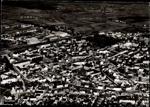Postcard Bruchsal in Kraichgau, aerial view of many houses, streets, fields, no people, black