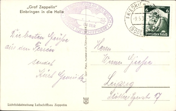 Postcard Friedrichshafen on Lake Constance, airship LZ 127 Graf Zeppelin, bringing into the airship hangar