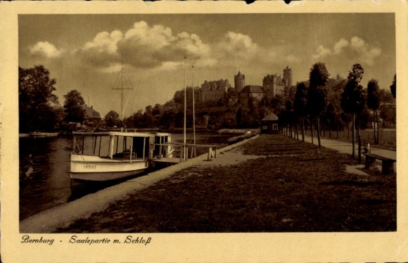 Postcard Bernburg an der Saale, castle in the background, boat on the shore, Saale section, trees