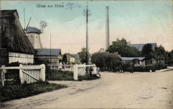 Ak Hohn in Sleeswijk-Holstein, straat, windmolen