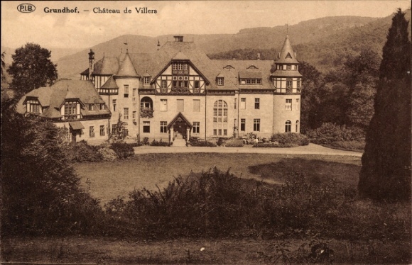 Ak Grundhof in Angeln, Château de Villers, herrschaftliches Gebäude, bewaldete Umgebung
