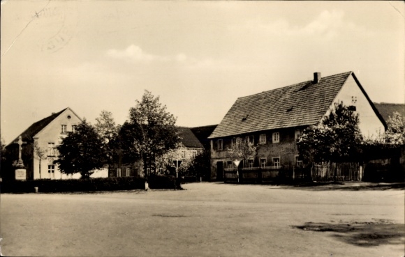 Picture of Weißwasser in Upper Lusatia, black and white photo of a street corner, houses, trees, quiet surroundings