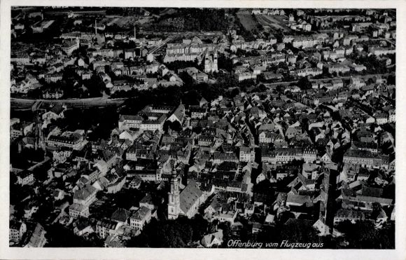 Postcard Offenburg in Baden Black Forest, aerial view of cityscape, many roofs, airplane perspective