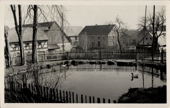 foto Ak Gaußig in Oberlausitz, gedeeltelijk uitzicht, vijver, vakwerkhuizen