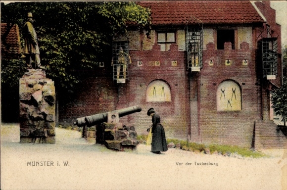 Ak Münster in Westfalen, Statue, Kanone,  Gebäude, Fenster mit Figuren