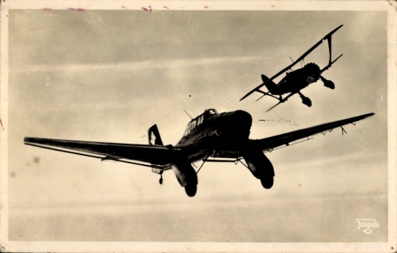 Postcard German Air Force, dive bomber Junkers Ju 87 is attacked by a fighter