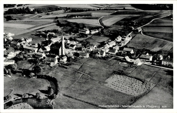 Postcard Hebertsfelden Lower Bavaria, aerial view of a village, church, fields, residential buildings