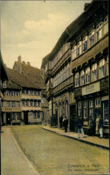 Postcard Osterwieck in Saxony Anhalt, old houses, Mittelstrasse, business