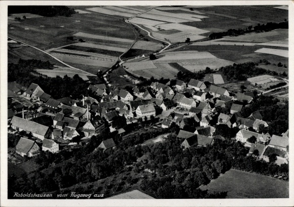 Postcard Raboldshausen Neuenstein in Hesse, aerial photograph, numerous roofs, rural surroundings, fields