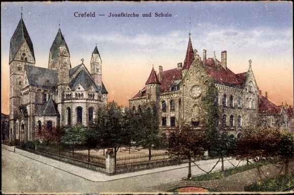 Ak Krefeld am Niederrhein, Josefkirche und Schule, Außenansicht