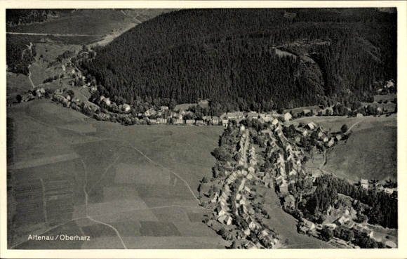 Postcard Altenau Oberharz, aerial photograph of the village, forests