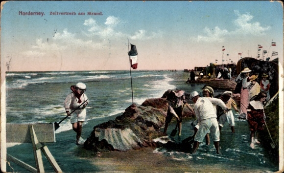 Postcard North Sea resort Norderney East Frisia, beach activities, people at the water, flag, beach chairs