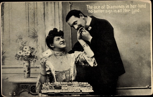 Postcard The Ace of Diamonds in her hand, woman lays out the cards for man, fortune teller