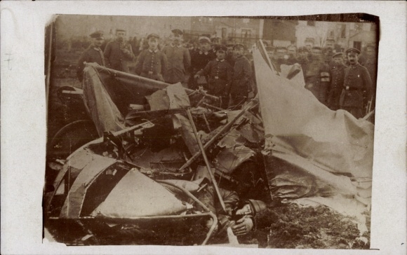 Photo Postcard German soldiers with a shot down plane, 1st World War