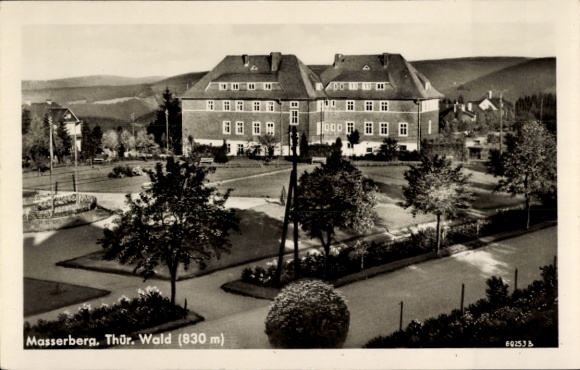 Postcard Masserberg in Thuringia, Thuringian Forest, building complex, parking lot, trees