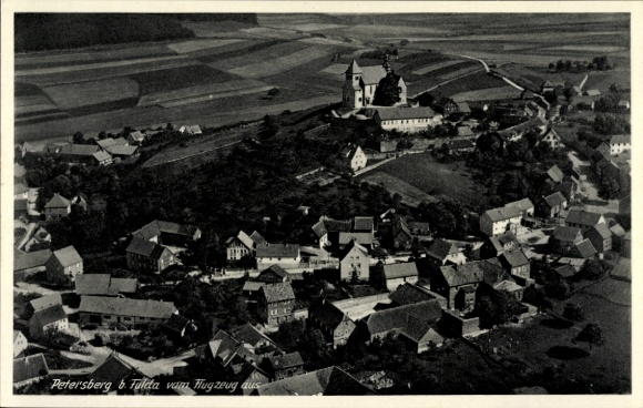 Postcard Petersberg (near Fulda) Hesse, aerial view of Petersberg, church buildings, residential buildings, fields