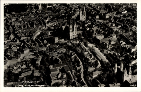 Postcard Halberstadt am Harz, aerial view of town churches, town houses, r place