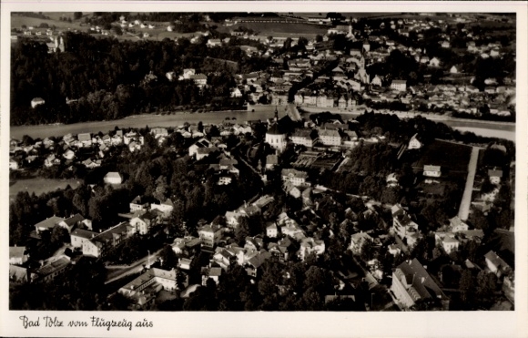 Postcard Bad Tölz in Upper Bavaria, aerial view of river, buildings, trees