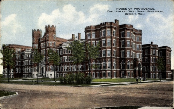 Ak Detroit Michigan USA, House of Providence, hoektoren, bakstenen gebouw, straatbeeld