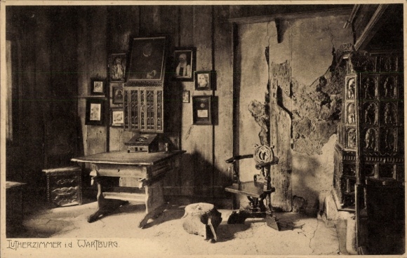 Postcard Lutherstadt Eisenach in Thuringia, Wartburg, Luther room table, chair, pictures on the wall,