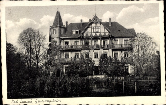 Ak Bad Lausick in Sachsen,  Genesungsheim, Gebäude mit Türmen, Bäume, Garten