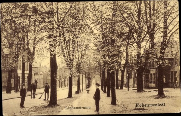 PC Hohenwestedt in Holstein, view of Lindenstrasse, street sweeper
