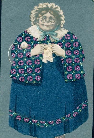 Fabric Postcard Fat woman with hood and knitting