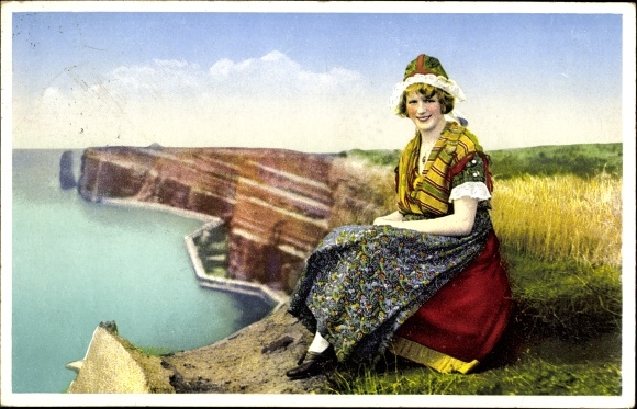 PC Heligoland, Helgoland woman in traditional costume, cliff