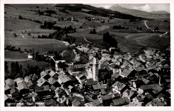 Postcard Nesselwang in Allgäu, aerial view of church, surrounding mountains, typical houses