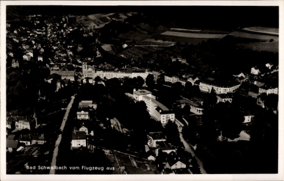 Postcard Bad Schwalbach im Taunus, aerial view of houses, landscape, airplane view