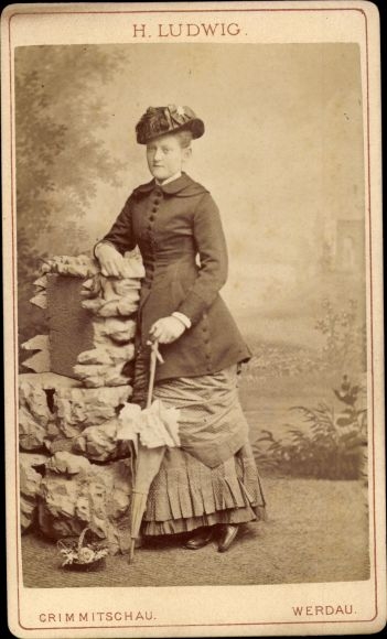CdV Werdau an der Pleiße in Saxony, portrait of a woman with an umbrella