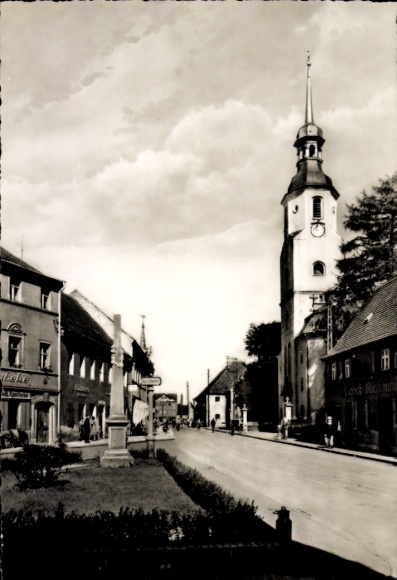 Postcard Elsterwerda Elster, on the main street, church