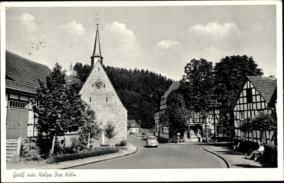 Ak Holpe Morsbach im Oberbergischen Kreis, Straßenpartie im Ort, Kirche