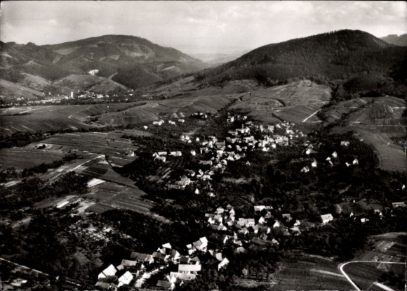 Postcard Bühl in Baden Black Forest, aerial view of a wine village, vineyards, numerous houses, mountains in