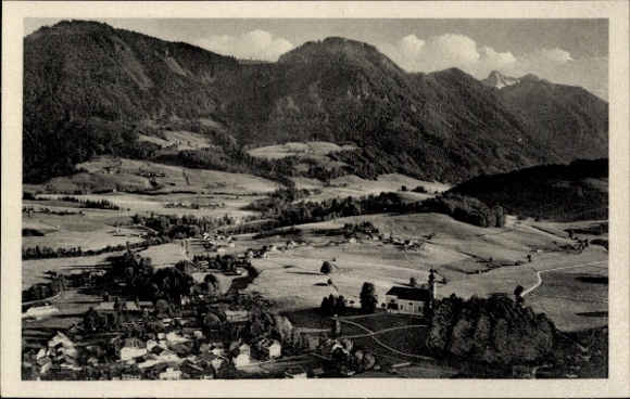 Postcard Ruhpolding in Upper Bavaria, landscape view with mountains, fields, small villages