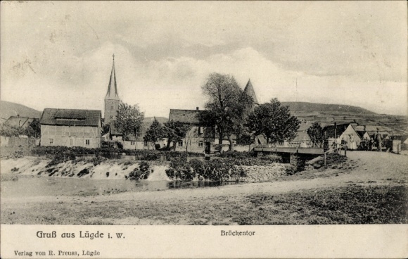 Postcard Lügde in the Weserbergland, bridge gate, partial view of the town