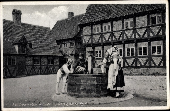 Postcard Århus Aarhus Denmark, people in traditional costumes at the fountain