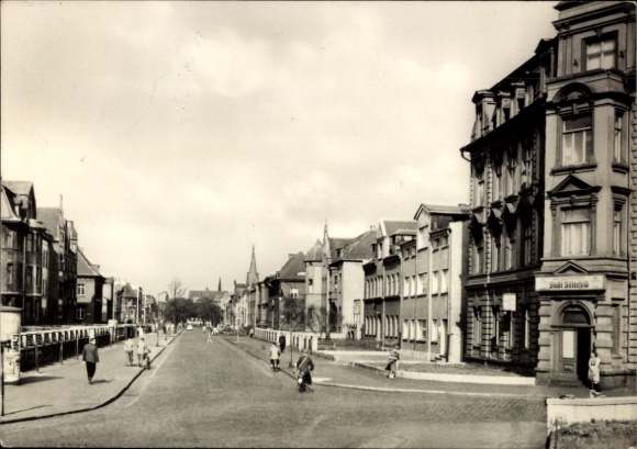 Postcard Bitterfeld in Saxony-Anhalt, city view with streets, older buildings, trees, people
